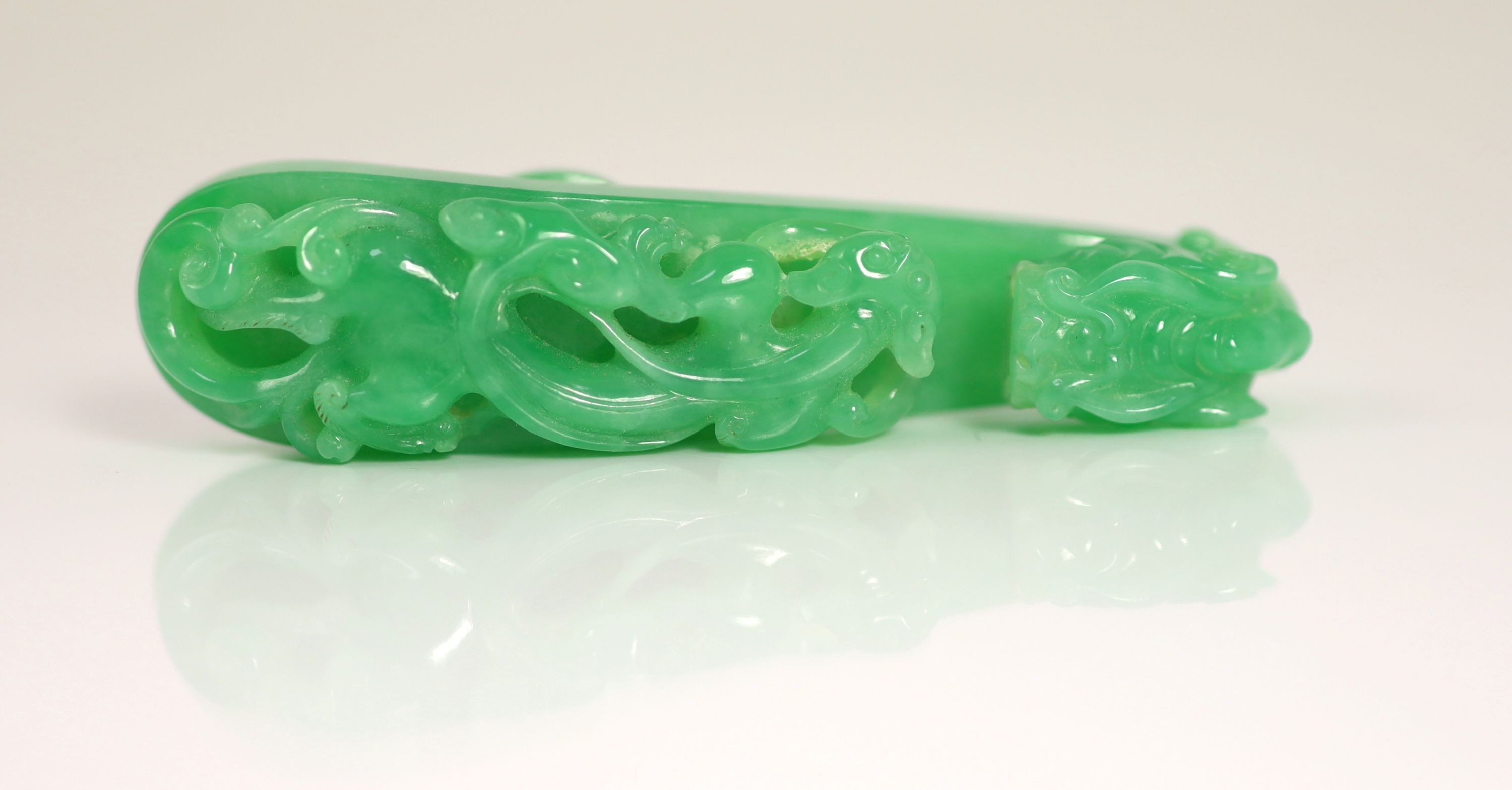 A Chinese jadeite ‘dragon’ belt hook, 8.8cm long